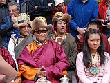 Mustang Lo Manthang Tiji Festival Day 2 07 Future King And Daughter The Future King and his 16-year old daughter wearing traditional dress, and other dignitaries took their positions around 16:00. The Future King looks very, eh, how you say, kingly. He smiles perfectly, says hello to local people and tourists alike, and poses perfectly for photos.